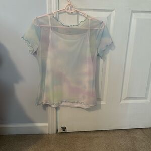 Mesh shirt with white tank attached under.